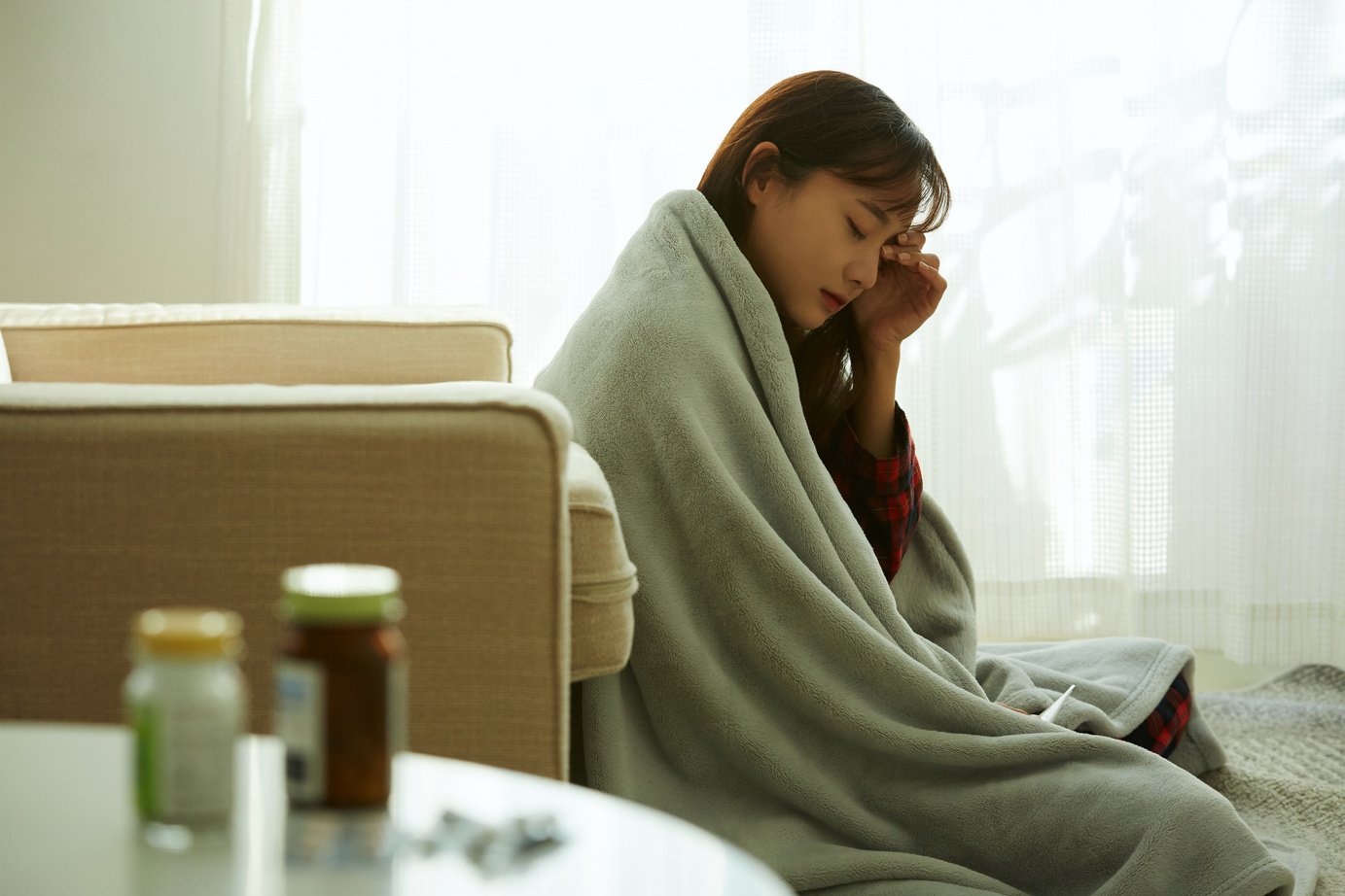 Young woman in poor health